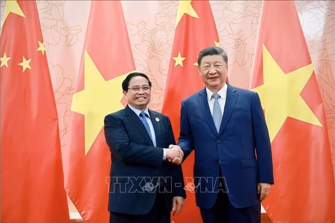 Thủ tướng Phạm Minh Chính hội kiến Tổng Bí thư, Chủ tịch nước Trung Quốc Tập Cận Bình. (Ảnh: TTXVN)
