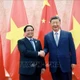 Thủ tướng Phạm Minh Chính hội kiến Tổng Bí thư, Chủ tịch nước Trung Quốc Tập Cận Bình. (Ảnh: TTXVN)