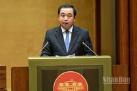 Bộ trưởng Nông nghiệp và Môi trường Trần Đức Thắng phát biểu giải trình vấn đề đại biểu Quốc hội nêu. (Ảnh: DUY LINH)