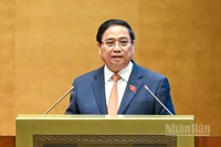 Thủ tướng Chính phủ Phạm Minh Chính trình bày Báo cáo kết quả thực hiện kế hoạch phát triển kinh tế-xã hội năm 2025 và 5 năm 2021-2025; dự kiến kế hoạch phát triển kinh tế-xã hội năm 2026. (Ảnh: DUY LINH)
