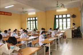 Thí sinh dự thi tốt nghiệp trung học phổ thông năm 2021. Ảnh: Đinh Tuấn/TTXVN