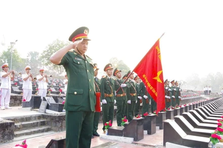 Lễ an táng hài cốt liệt sĩ tại Nghĩa trang Liệt sĩ tỉnh Bình Phước.