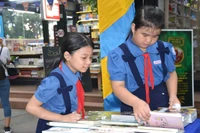 Các em thiếu nhi xem sách tại Hội sách thiếu nhi.