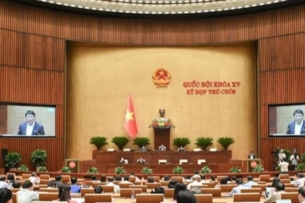 Quốc hội làm việc tại hội trường nghe Tờ trình và Báo cáo thẩm tra dự án Luật sửa đổi, bổ sung một số điều của Bộ luật Hình sự, ngày 20/5/2025. (Ảnh: BÙI GIANG)