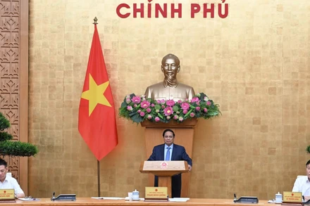 Thủ tướng Chính phủ Phạm Minh Chính chủ trì phiên họp về tháo gỡ khó khăn, vướng mắc, vận hành thông suốt chính quyền địa phương 2 cấp. (Ảnh: Trần Hải)