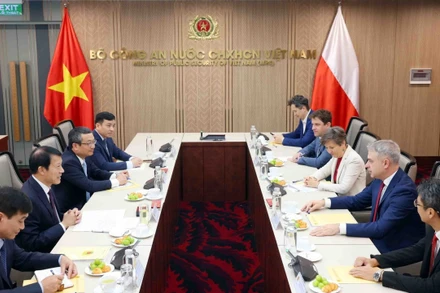 Đại tướng Lương Tam Quang, Bộ trưởng Công an tiếp Phó Thủ tướng, Bộ trưởng Bộ Kỹ thuật số Cộng hòa Ba Lan Krzysztof Gawkowski. (Ảnh: Phạm Kiên/TTXVN)