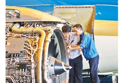 Các doanh nghiệp nhà nước được định vị tập trung vào một số ngành, lĩnh vực then chốt, chiến lược, giữ vai trò tiên phong và dẫn dắt. Ảnh: KHIẾU MINH