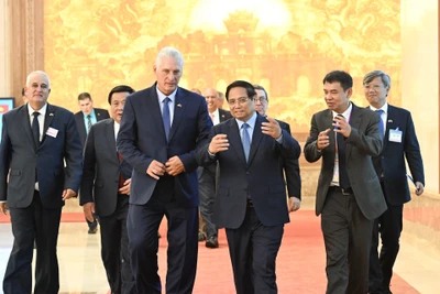 Thủ tướng Phạm Minh Chính và Bí thư Thứ nhất, Chủ tịch nước Cuba Miguel Diaz-Canel Bermudez. 