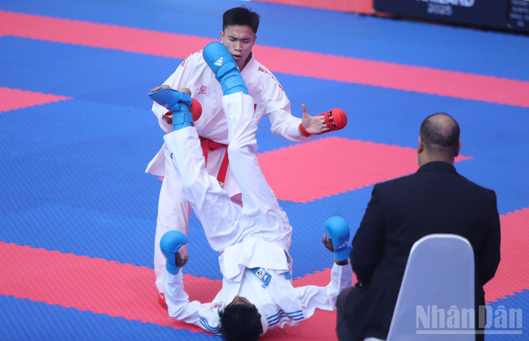 ជូ វ៉ាន់ ឌួក បានទទួលមេដាយប្រាក់ បន្ទាប់ពីចាញ់ក្នុងការប្រកួតផ្តាច់ព្រ័ត្រ។ ndo_br_f3ae86cd61b3eeedb7a2.jpg