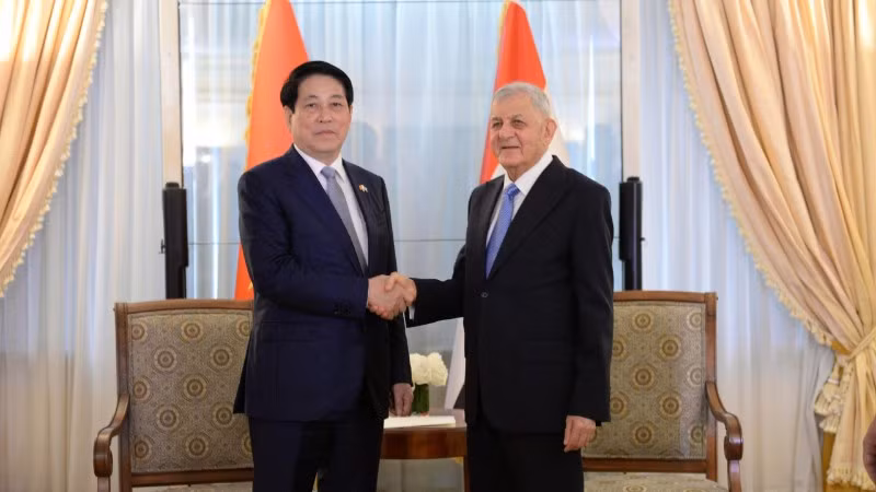 Chủ tịch nước Lương Cường gặp Tổng thống Iraq Abdul Latif Rashid. (Ảnh: XUÂN KỲ)