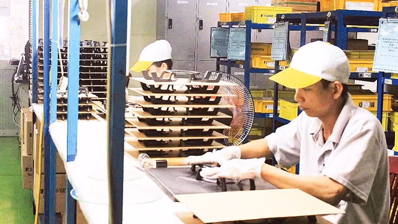 Sản xuất linh kiện cơ khí phục vụ xuất khẩu tại Công ty TNHH Kondo Việt Nam, Khu công nghiệp Hiệp Phước, Thành phố Hồ Chí Minh. (Ảnh THẾ ANH)