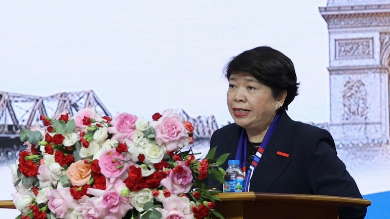 Η σύντροφος Νγκουγιέν Τούι Αν εκφώνησε χαιρετισμό στο συνέδριο. yphap-viet1.jpg