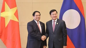 Thủ tướng Phạm Minh Chính hội kiến Tổng Bí thư, Chủ tịch nước Lào Thongloun Sisoulith. (Ảnh: VGP/Nhật Bắc)