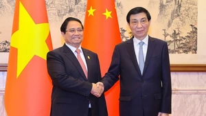 Thủ tướng Phạm Minh Chính hội kiến Chủ tịch Chính hiệp toàn quốc Trung Quốc - Ảnh: VGP/Nhật Bắc
