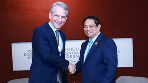 Thủ tướng Phạm Minh Chính tiếp ông Peter Koerte, Giám đốc công nghệ và Giám đốc chiến lược Tập đoàn Siemens AG (Đức). (Ảnh: TTXVN)