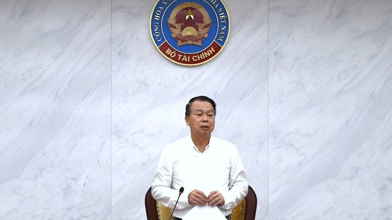 Thứ trưởng Tài chính Nguyễn Đức Chi chủ trì hội nghị.