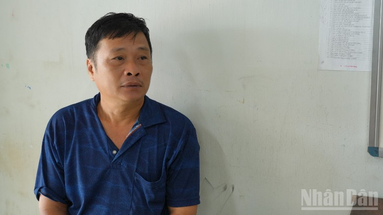 Đối tượng Lưu Hữu Phước tại cơ quan công an. ndo_br_2-doi-tuong-luu-huu-phuoc-anh-trong-tin-6257.jpg
