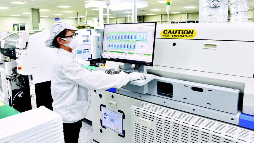 Dây chuyền sản xuất linh kiện điện tử của Công ty TNHH Bumjin Electronics Vina (100% vốn đầu tư của Hàn Quốc) (Quảng Ninh). (Ảnh: TRẦN HẢI)