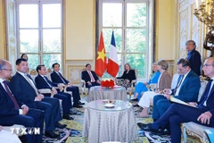 Thủ tướng Phạm Minh Chính hội kiến Chủ tịch Quốc hội Pháp.