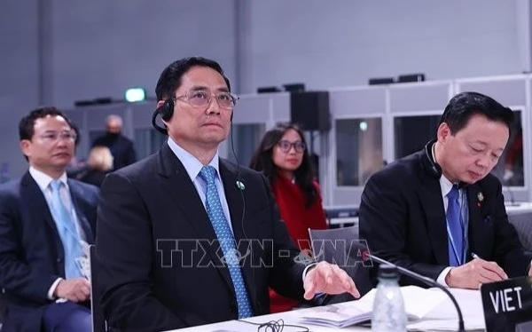Thủ tướng Chính phủ Phạm Minh Chính dự Hội nghị Thượng đỉnh khí hậu được tổ chức trong khuôn khổ Hội nghị lần thứ 26 các Bên tham gia Công ước khung của Liên hợp quốc về Biến đổi khí hậu (COP26). (Ảnh: Dương Giang-TTXVN)