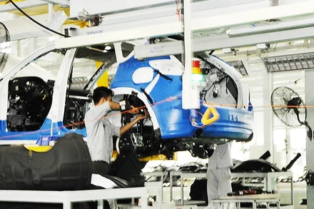 Lắp ráp tại Công ty CP Ô-tô Trường Hải. Ảnh: NAM ANH