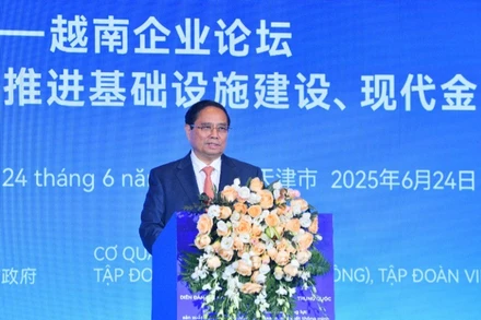 Thủ tướng Chính phủ Phạm Minh Chính phát biểu ý kiến tại Diễn đàn Kết nối Doanh nghiệp Việt Nam-Trung Quốc. (Ảnh: THANH GIANG)