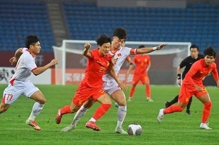 U22 Việt Nam (áo trắng) thi đấu kiên cường, thắng đội chủ nhà U22 Trung Quốc 1-0.