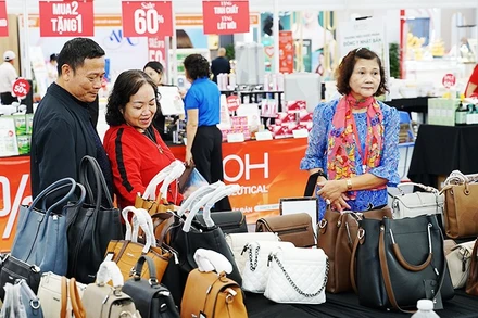 Đẩy mạnh các hoạt động xúc tiến thương mại nhằm kích cầu tiêu dùng trong nước. Ảnh: NAM NGUYỄN