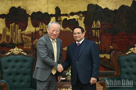Thủ tướng Phạm Minh Chính đón ông Nghiêm Giới Hòa, người sáng lập Tập đoàn xây dựng Thái Bình Dương.