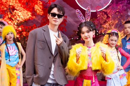 Nhạc sĩ Tuấn Cry và ca sĩ nhí Kim Cương trong MV mới.