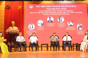 Các đại biểu chia sẻ tại hội thảo.