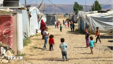 Trẻ em Syria tại trại tị nạn ở Saadnayel, Liban, ngày 13/6/2023. (Ảnh: AFP/TTXVN)