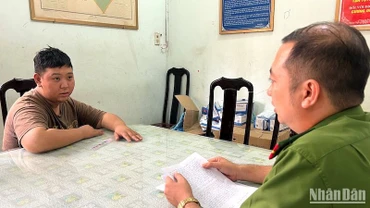 Đối tượng Đặng Minh Khang tại cơ quan Công an.