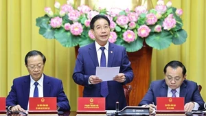 Phó Chủ nhiệm Văn phòng Chủ tịch nước Phạm Thanh Hà chủ trì Họp báo. (Ảnh: TTXVN)