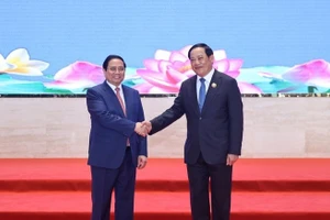 Thủ tướng Chính phủ Phạm Minh Chính và Thủ tướng Chính phủ Lào Sonexay Siphandone. (Ảnh: VGP/Nhật Bắc)