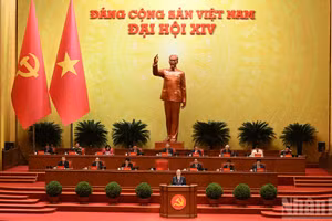 Tổng Bí thư Tô Lâm Báo cáo về các văn kiện trình Đại hội XIV Đảng Cộng sản Việt Nam tại phiên khai mạc Đại hội đại biểu toàn quốc lần thứ XIV Đảng Cộng sản Việt Nam. (Ảnh: TRẦN HẢI)