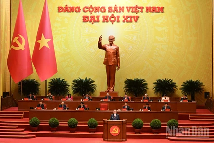 Tổng Bí thư Tô Lâm Báo cáo về các văn kiện trình Đại hội XIV Đảng Cộng sản Việt Nam tại phiên khai mạc Đại hội đại biểu toàn quốc lần thứ XIV Đảng Cộng sản Việt Nam. (Ảnh: TRẦN HẢI)