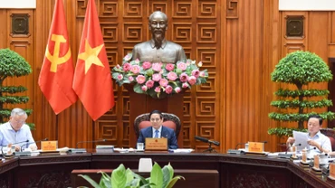 Thủ tướng Chính phủ Phạm Minh Chính chủ trì cuộc họp Thường trực Chính phủ với các bộ, ngành liên quan để chuẩn bị đàm phán thương mại với Hoa Kỳ. (Ảnh: TRẦN HẢI). 