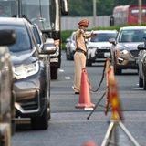 Lực lượng cảnh sát giao thông tổ chức phân luồng, điều tiết giao thông. (Nguồn Cục Cảnh sát giao thông) 