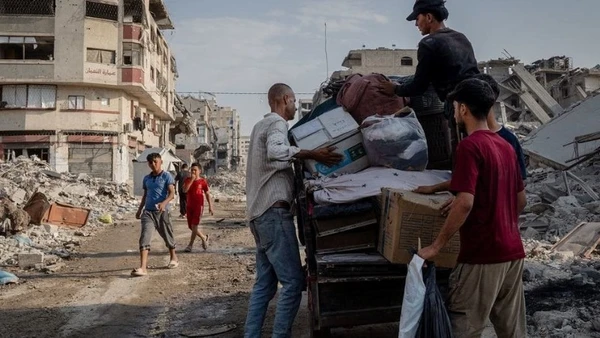 Người dân ở Gaza trở về nhà sau khi lệnh ngừng bắn có hiệu lực. (Ảnh WEF)