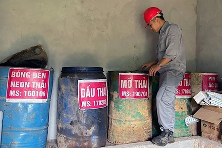 Nhà kho phân loại, lưu giữ chất thải nguy hại phát sinh trong quá trình sản xuất tại Công ty Cổ phần Khai khoáng Minh Đức, tỉnh Yên Bái. (Ảnh: Thanh Ngà)