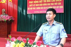 Đồng chí Vũ Thành Long, Phó Chủ tịch Thường trực Hội đồng Thi đua-Khen thưởng Chi đội Kiểm ngư số 3 phát biểu tại buổi lễ. (Ảnh: TIẾN DŨNG)