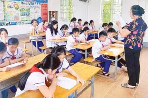 Nghệ nhân Nguyễn Thị Hương, người truyền lửa cho Câu lạc bộ Dân ca Ví, Giặm Nghệ Tĩnh Hưng Tân. (Ảnh TRỌNG TÂM)