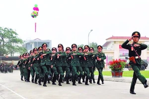 Các lực lượng vũ trang tỉnh Nghệ An trong lễ ra quân. (Ảnh TRUNG HIẾU)