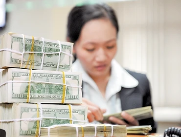 Tỷ giá và niềm tin thị trường