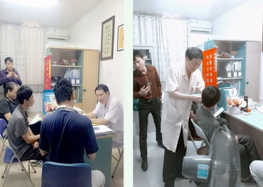 ThS Đào Hữu Minh đang tư vấn và dán nhĩ áp điều trị cho bệnh nhân.