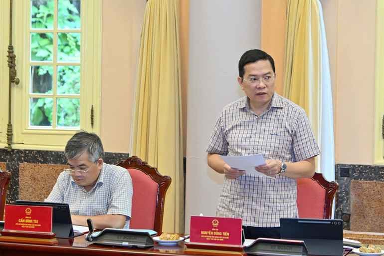 Phó Chủ nhiệm Văn phòng Chủ tịch nước Nguyễn Dũng Tiến báo cáo tại buổi làm việc. (Ảnh: THỦY NGUYÊN) z6950459574363-3e0d171066d2ce50b67017084f83ceb1.jpg