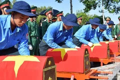 Đội K91 tìm kiếm, quy tập hài cốt liệt sĩ hy tại Campuchia. (Ảnh CHÍ PHÚC)