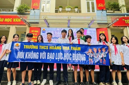 Học sinh Trường THCS Hoàng Hoa Thám (Hà Nội) cùng nhau xây dựng môi trường học tập an toàn, thân thiện. (Ảnh: KCN)