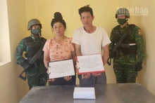 Đối tượng Lường Văn Ngoan và Tòng Thị Mầng cùng tang vật.